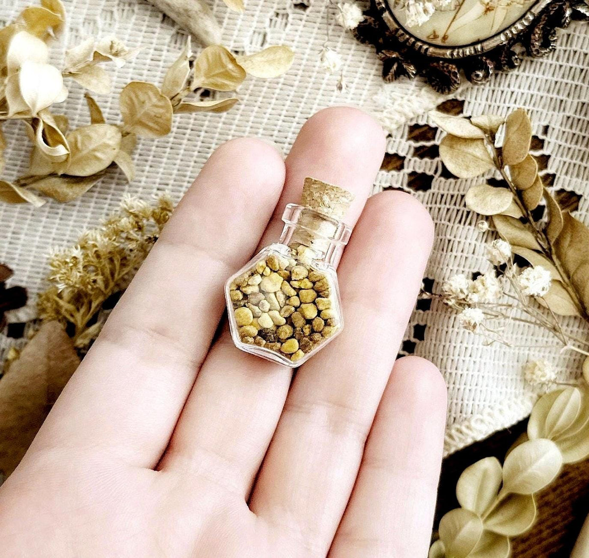 Bee Pollen Granules in Tiny Glass Hexagon Vial